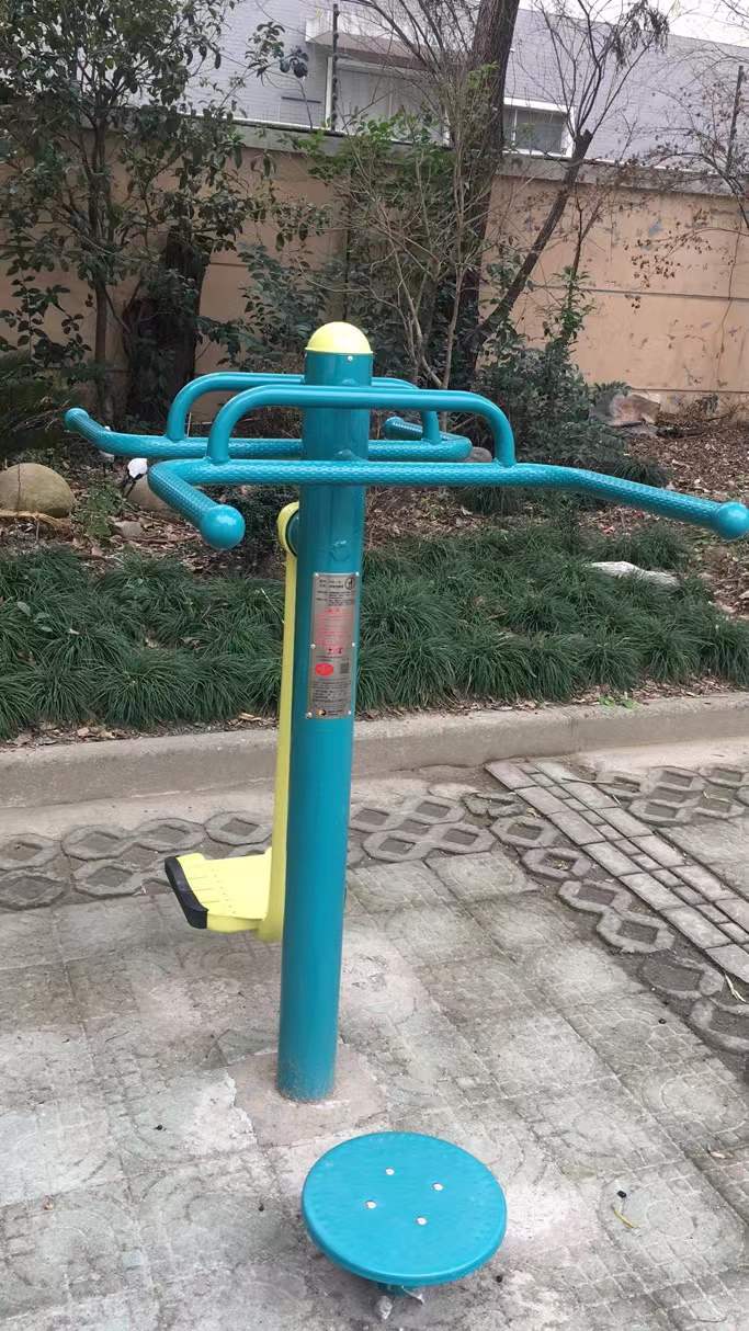 扭腰鐘擺器